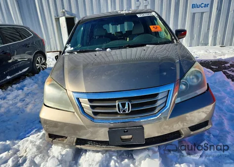 2010 Honda Odyssey Lx z USA, uszkodzony, nr VIN 5FNRL3H23AB056572